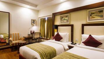 Deluxe Twin Room, City View | Minibar, in-room safe, desk, free WiFi