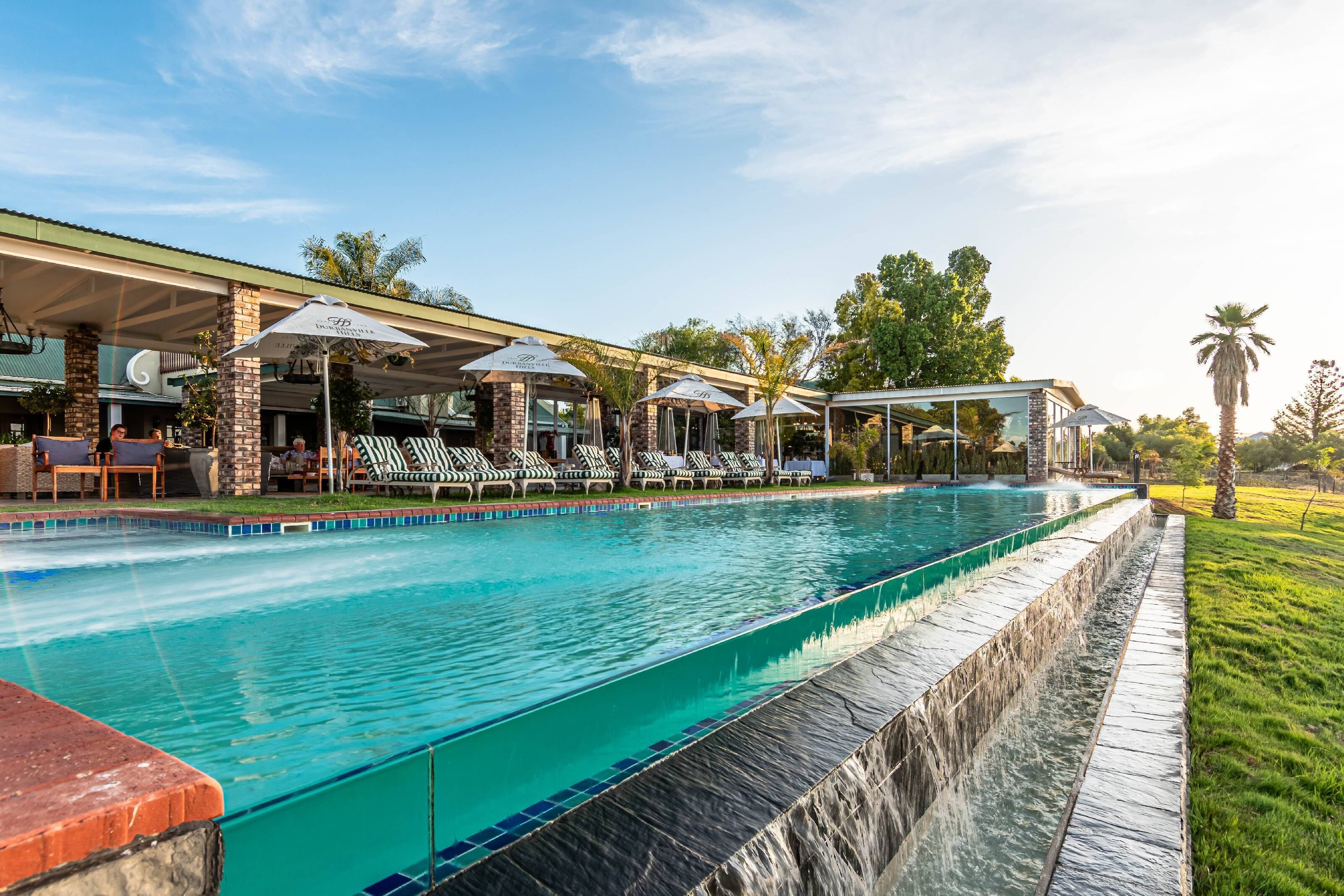 2 outdoor pools, pool umbrellas, sun loungers