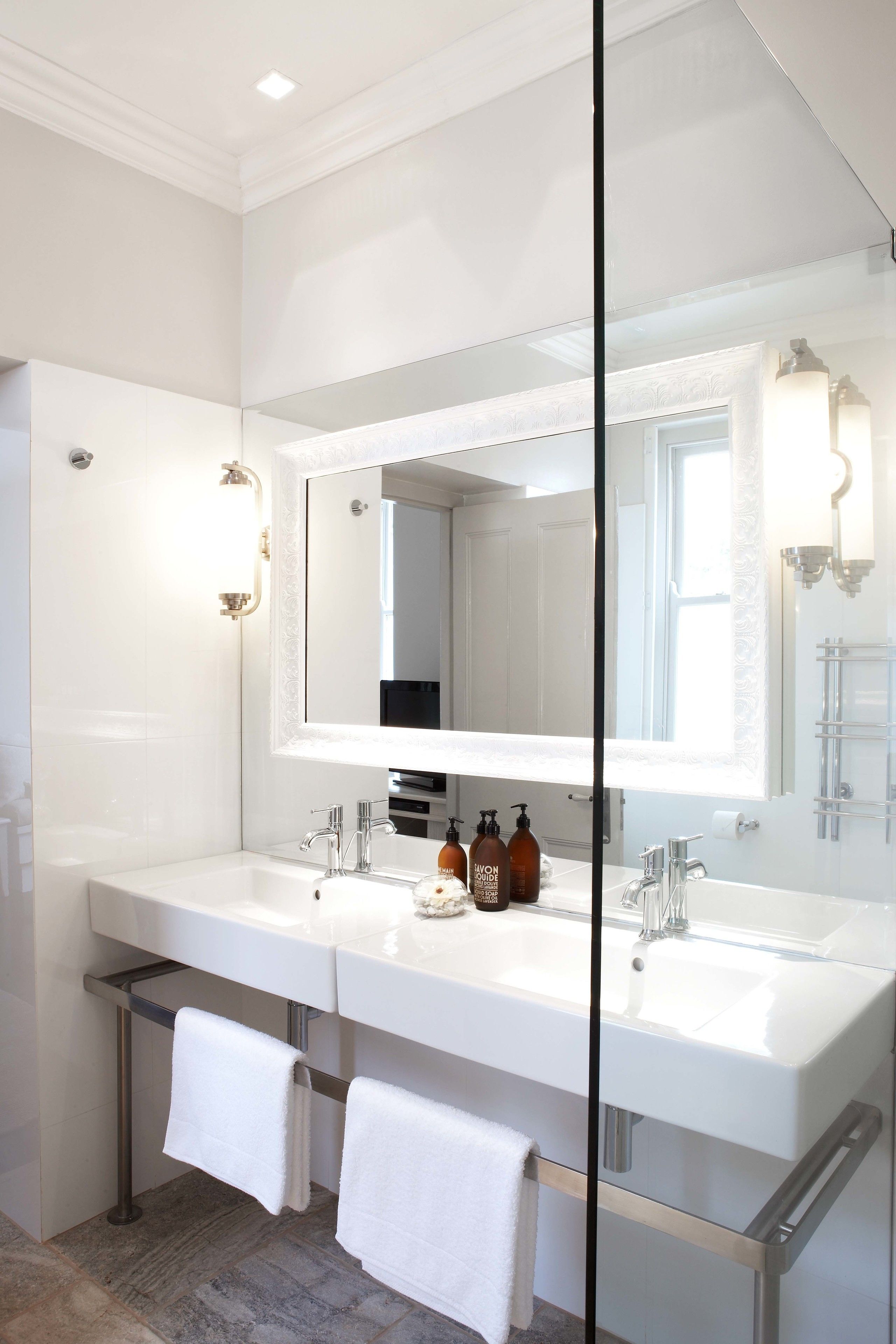 designer toiletries, hair dryer, bathrobes, slippers