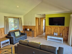 2 Bedrooms, 2 Bathrooms Self Contained Spa Cottage | Living area | 55-inch Smart TV with digital channels, TV - Golden Heritage Cottages (Beechworth)