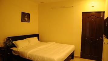 Premium bedding, desk, iron/ironing board, rollaway beds