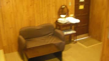 Superior Quadruple Room | Living area | Flat-screen TV