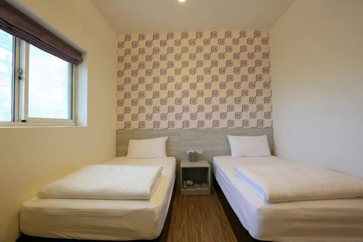 Desk, blackout drapes, WiFi (free), bed sheets