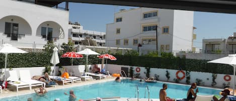 Outdoor pool, sun loungers