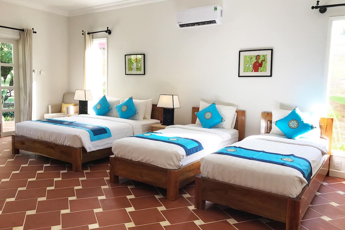 family quadruple room, garden view | minibar, in-room safe, desk, soundproofing