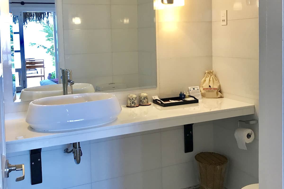 double room, beachfront | bathroom | shower, free toiletries, hair dryer, slippers