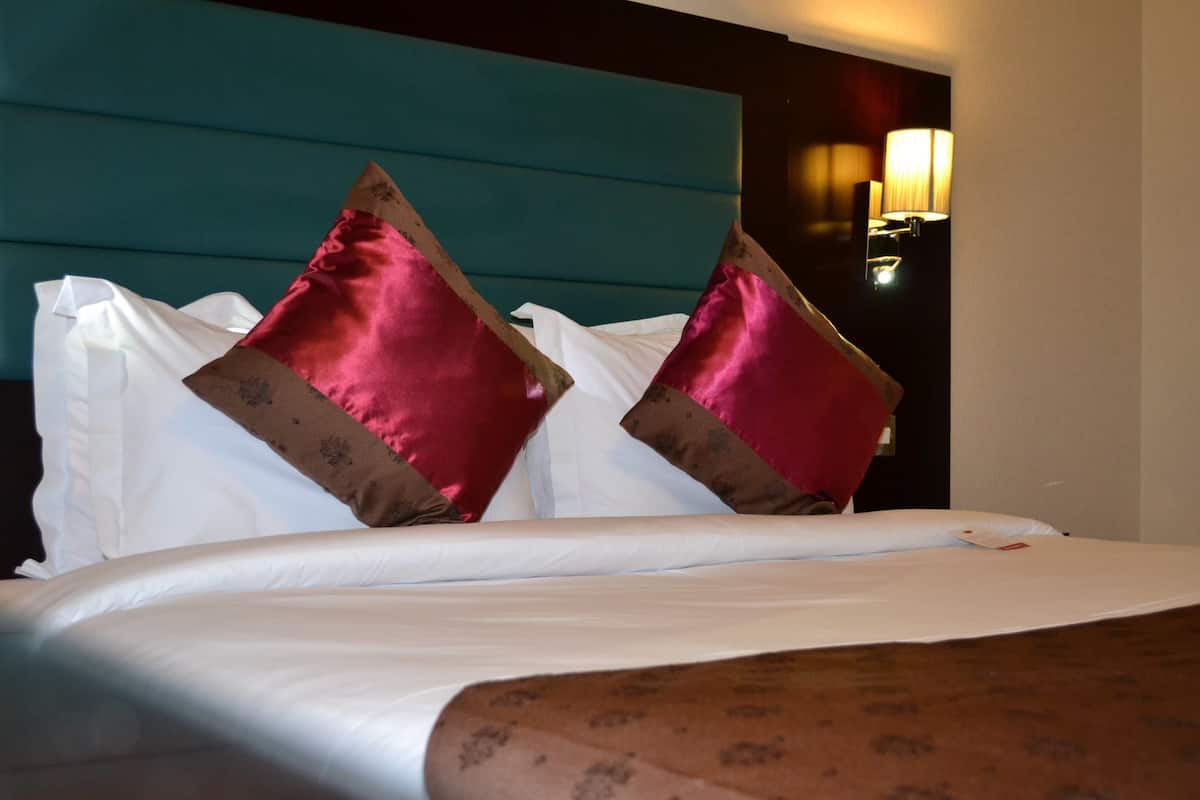 In-room safe, desk, iron/ironing board, free cribs/infant beds