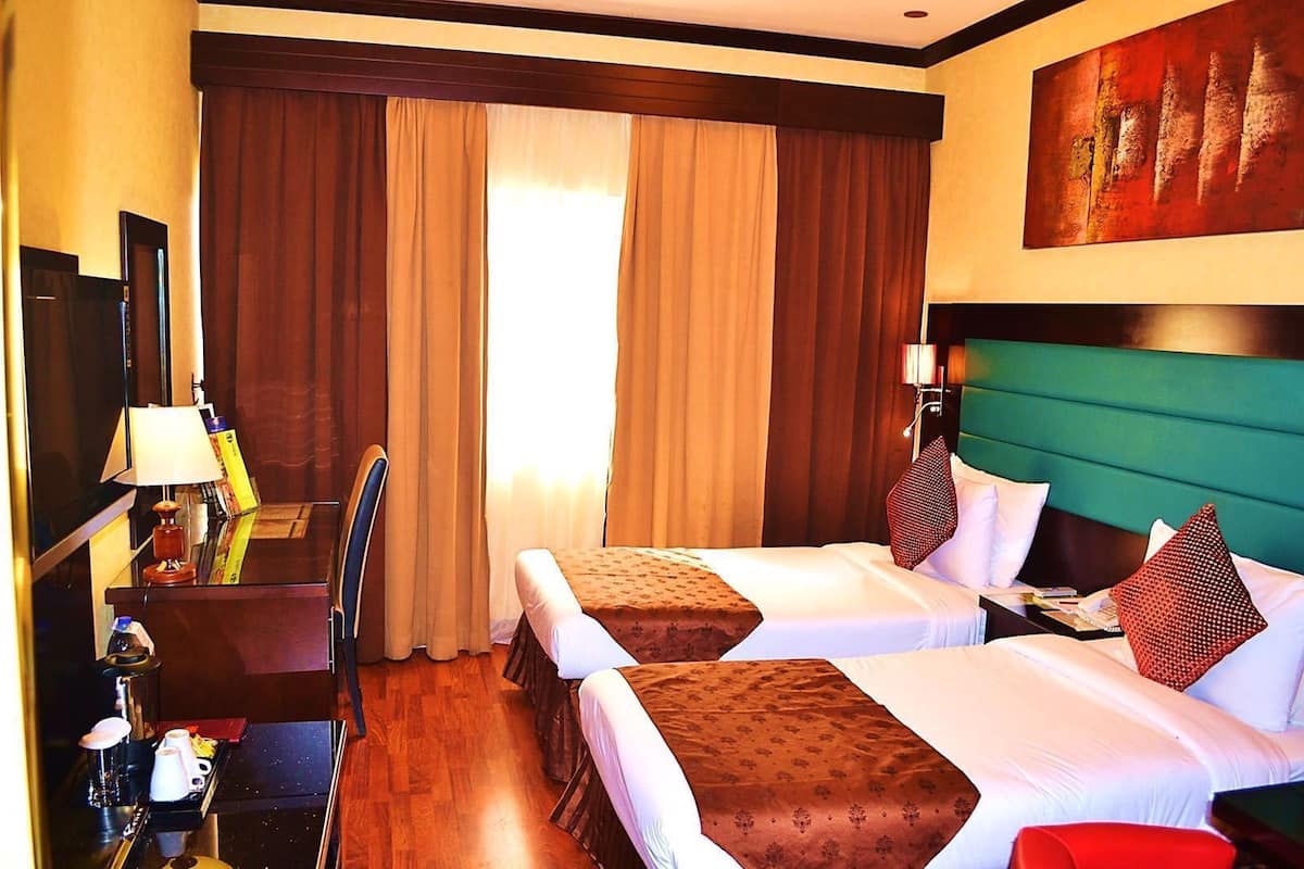 In-room safe, desk, iron/ironing board, free cribs/infant beds