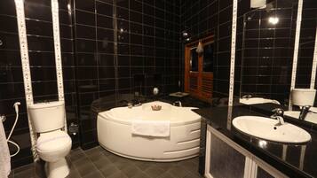 Deluxe Double Room Single Use | Bathroom | Deep soaking tub, free toiletries, hair dryer, bidet