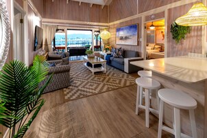 2 Bedroom Lagoon View Family Superior Chalet 04 | Living area | Flat-screen TV, table tennis