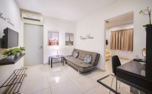Family Room | 1 bedroom, desk, iron/ironing board, free WiFi