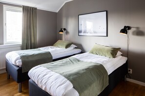 Departamento | Ropa de cama de alta calidad y tabla de planchar con plancha 