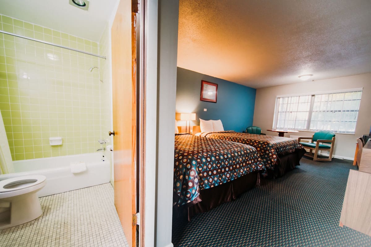 Desk, laptop workspace, free WiFi, bed sheets
