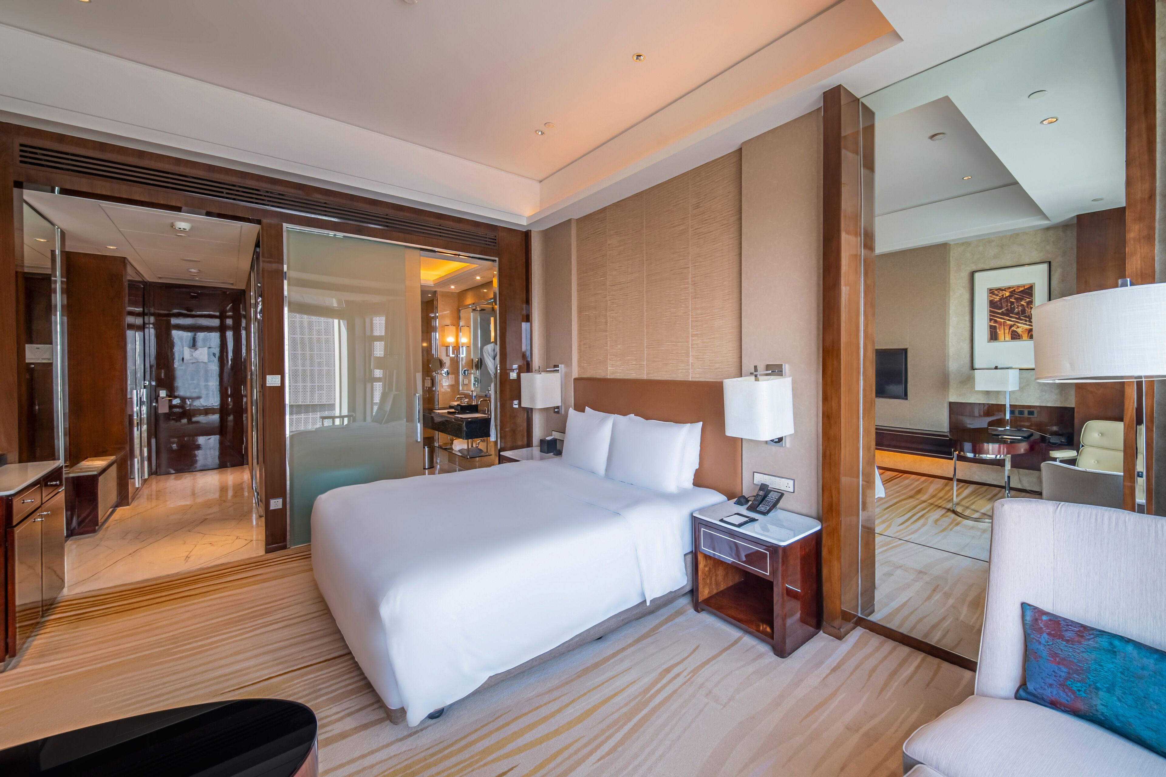 Premium bedding, down comforters, pillowtop beds, minibar