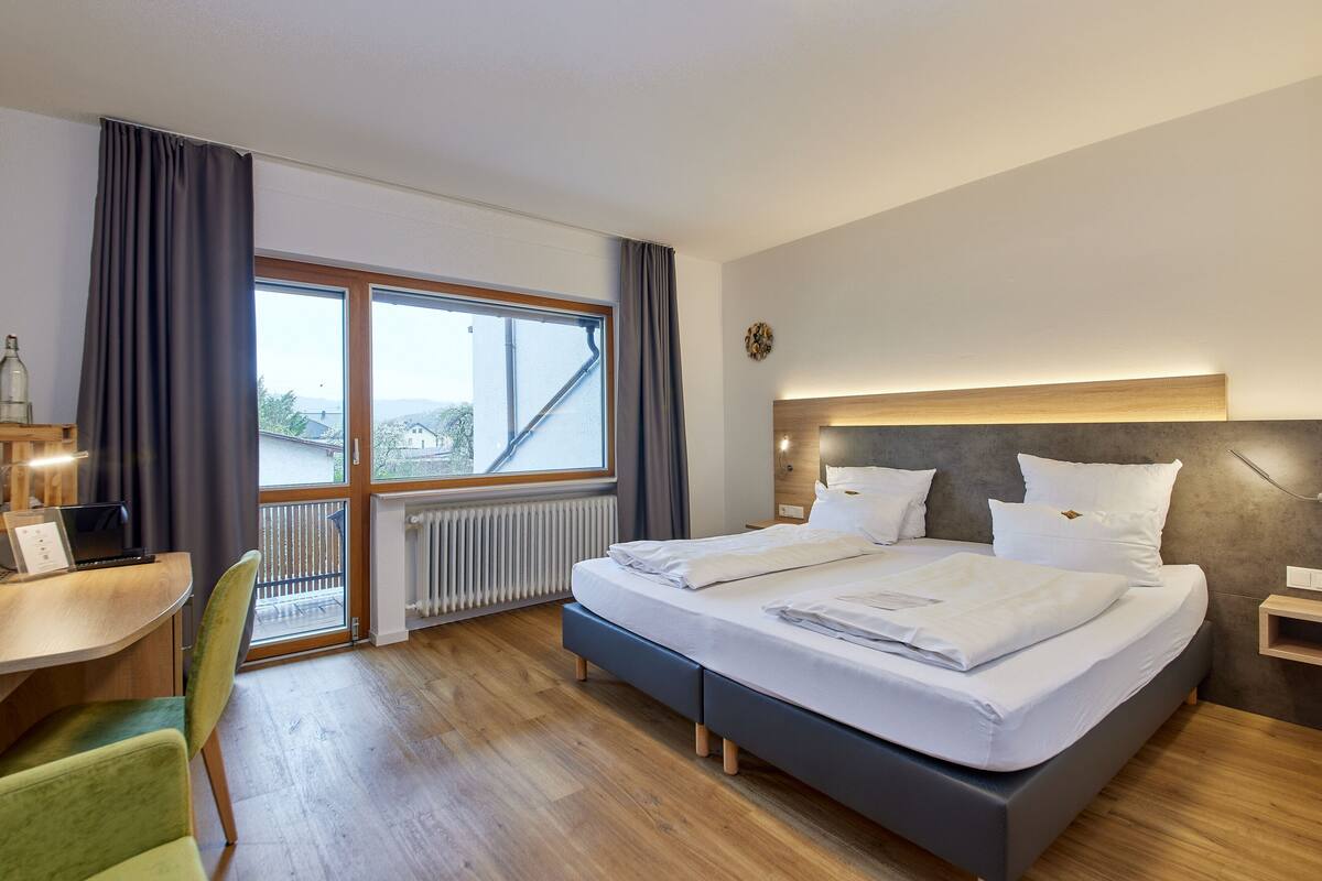 deluxe double room, 1 bedroom, balcony | 1 bedroom, minibar, desk, blackout curtains
