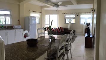 Apartment, 1 Bedroom | Living area | 32-inch flat-screen TV with cable channels, TV, MP3 dock