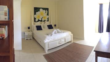 Apartment, 2 Bedrooms, Ocean View | In-room safe, individually decorated, individually furnished, desk