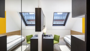 Luxe beddengoed, donsdekens, een minibar, een kluis op de kamer