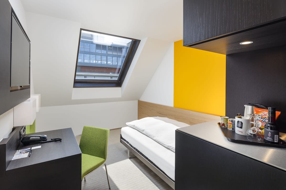 Premium bedding, down comforters, minibar, in-room safe