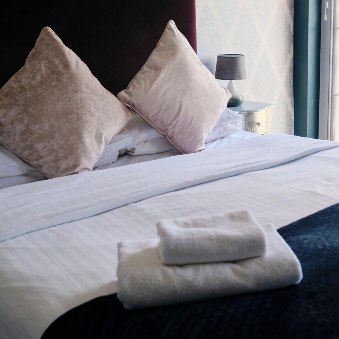 deluxe double room, 1 double bed, non smoking, sea view | in-room safe, iron/ironing board, free wifi, bed sheets