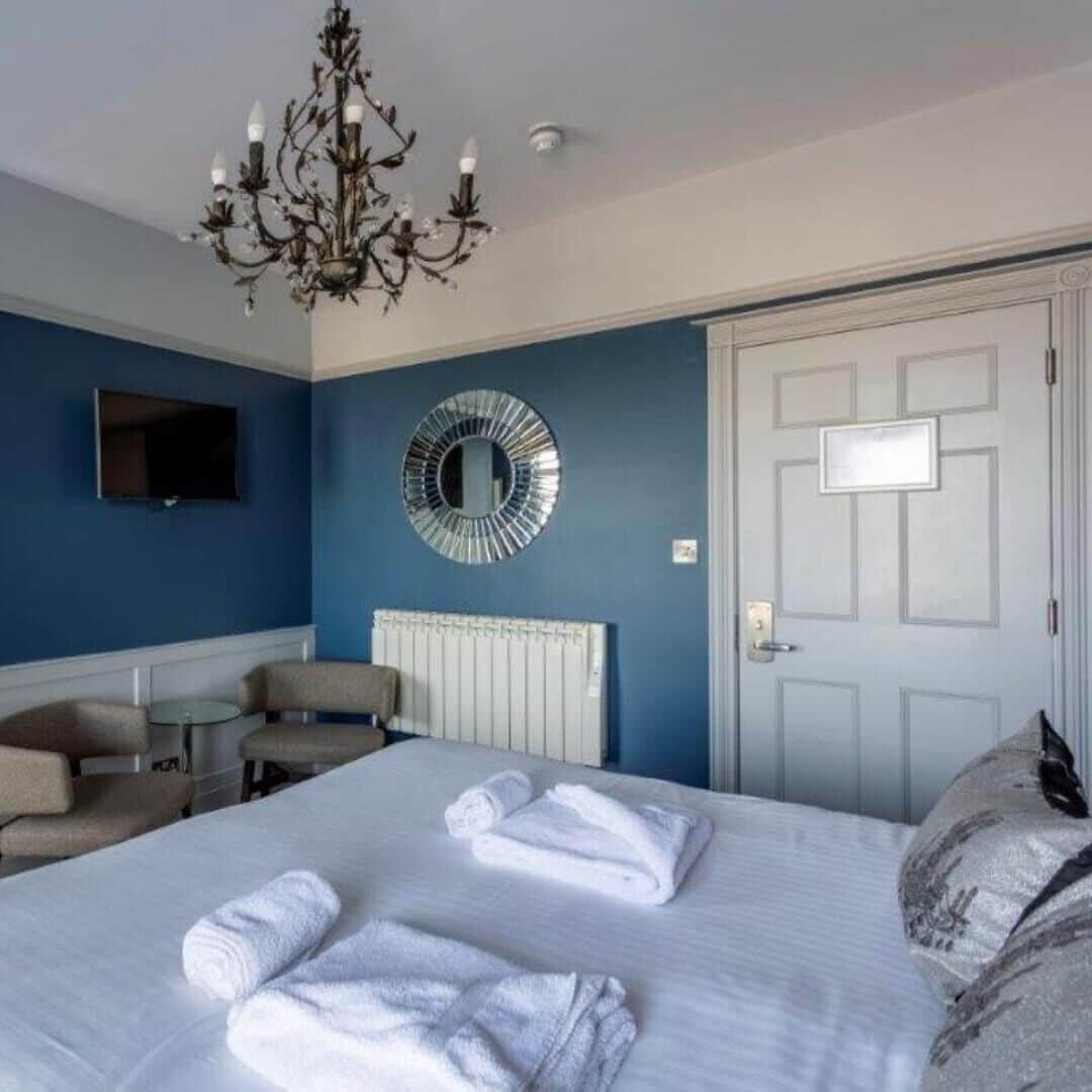 deluxe double room, 1 double bed, non smoking, sea view | in-room safe, iron/ironing board, free wifi, bed sheets