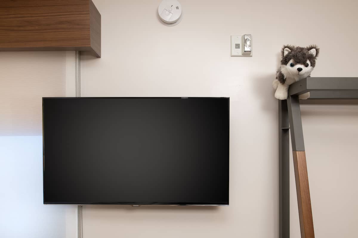 Literie de qualité, lit avec matelas à plateau-coussin, bureau