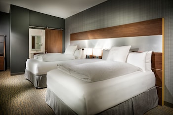 Premium bedding, pillowtop beds, desk, laptop workspace at Hotel Z