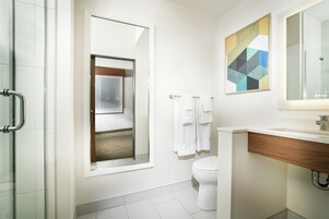 Designer toiletries, hair dryer, bathrobes, towels