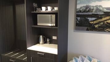 Fridge, microwave, coffee/tea maker, electric kettle