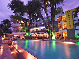 Outdoor pool, open 7 AM to 9 PM, pool umbrellas, sun loungers