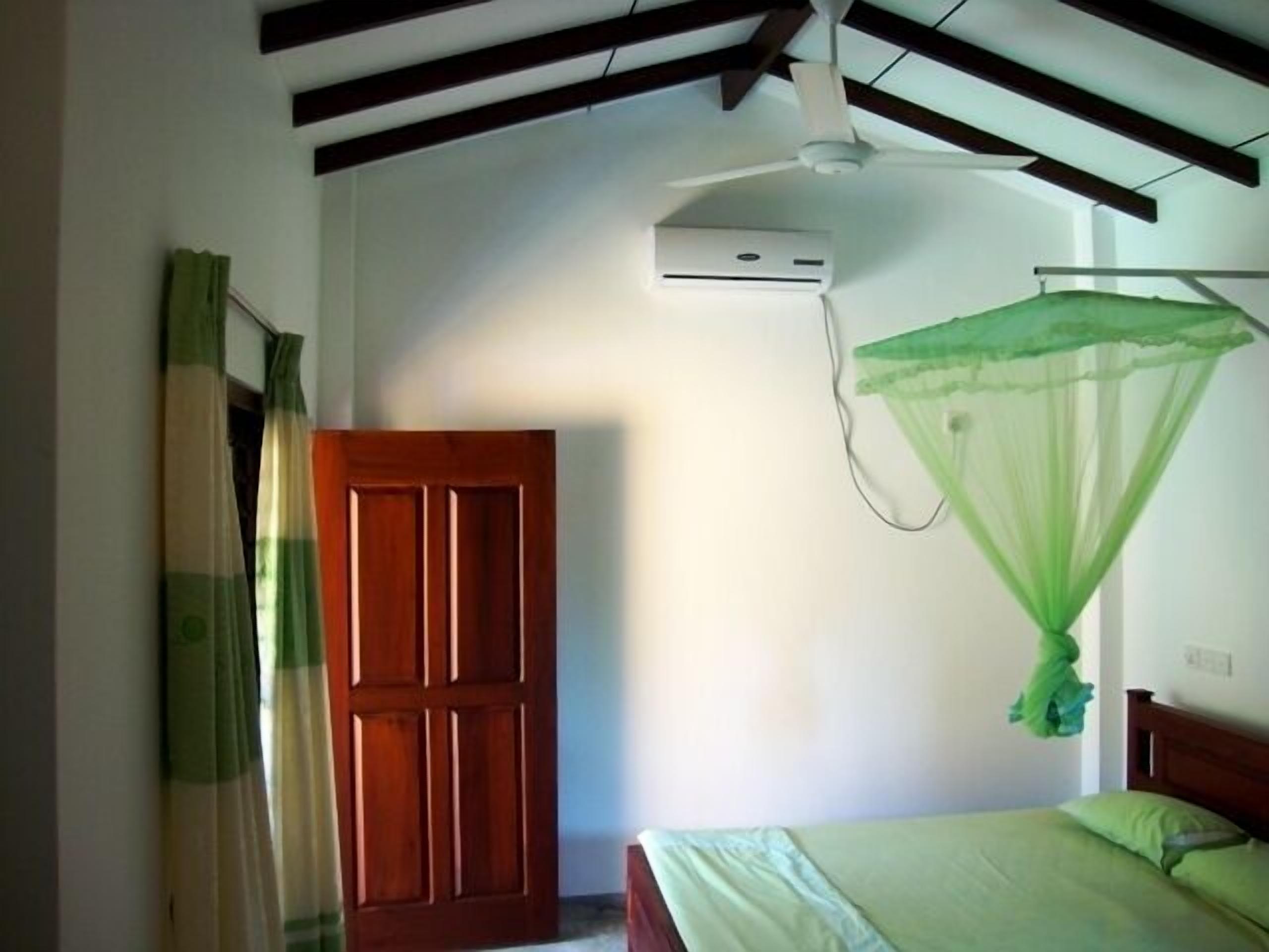 standard double room, 1 king bed, private bathroom, garden view | 1 bedroom, premium bedding, desk, free cots/infant beds