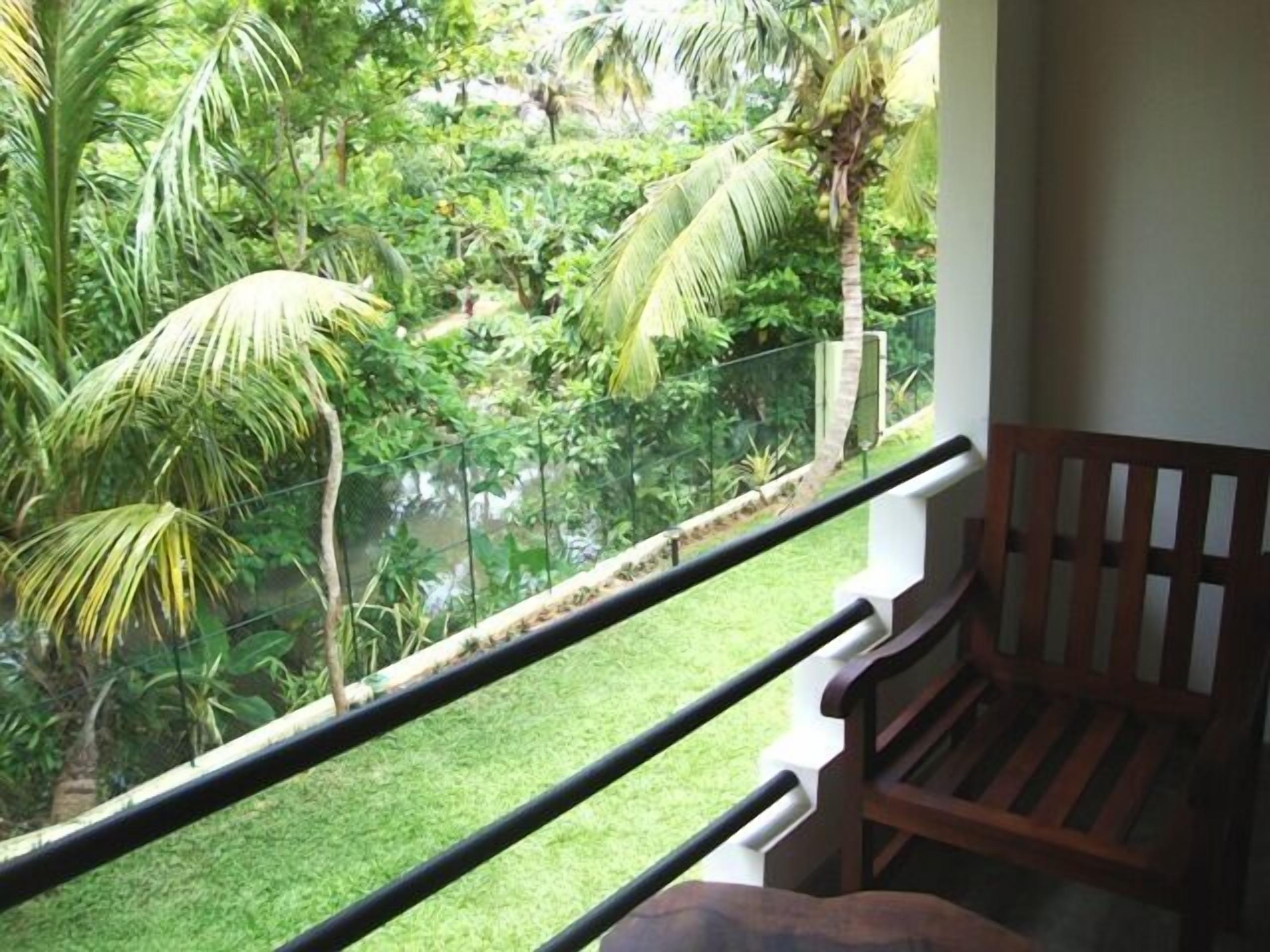 standard double room, 1 king bed, private bathroom, garden view | view from room