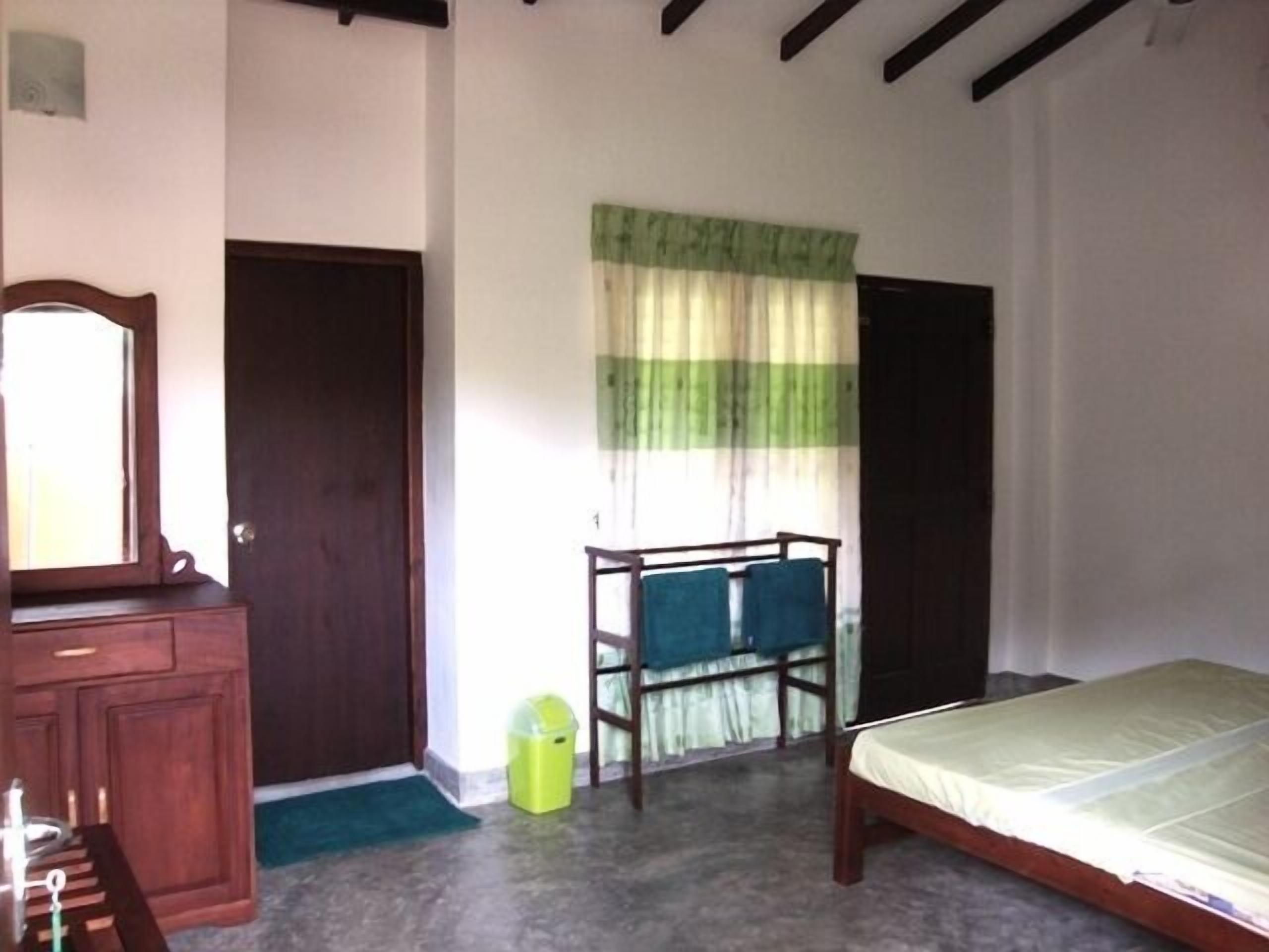 standard double room, 1 king bed, private bathroom, garden view | 1 bedroom, premium bedding, desk, free cots/infant beds