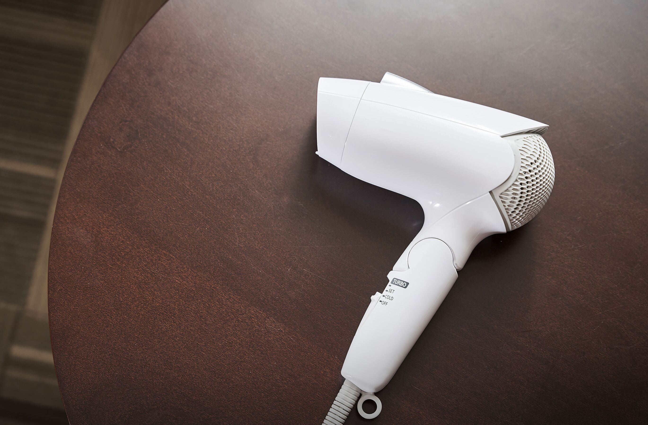 combined shower/bathtub, free toiletries, hair dryer, slippers