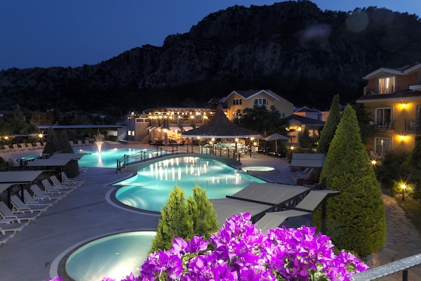 Seasonal outdoor pool, open 8:30 AM to 7 PM, pool umbrellas
