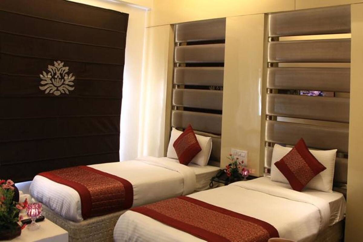 Luxury Double or Twin Room, Smoking, City View | Premium bedding, minibar, in-room safe, desk