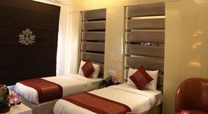 Luxury Double or Twin Room, Smoking, City View | Premium bedding, minibar, in-room safe, desk