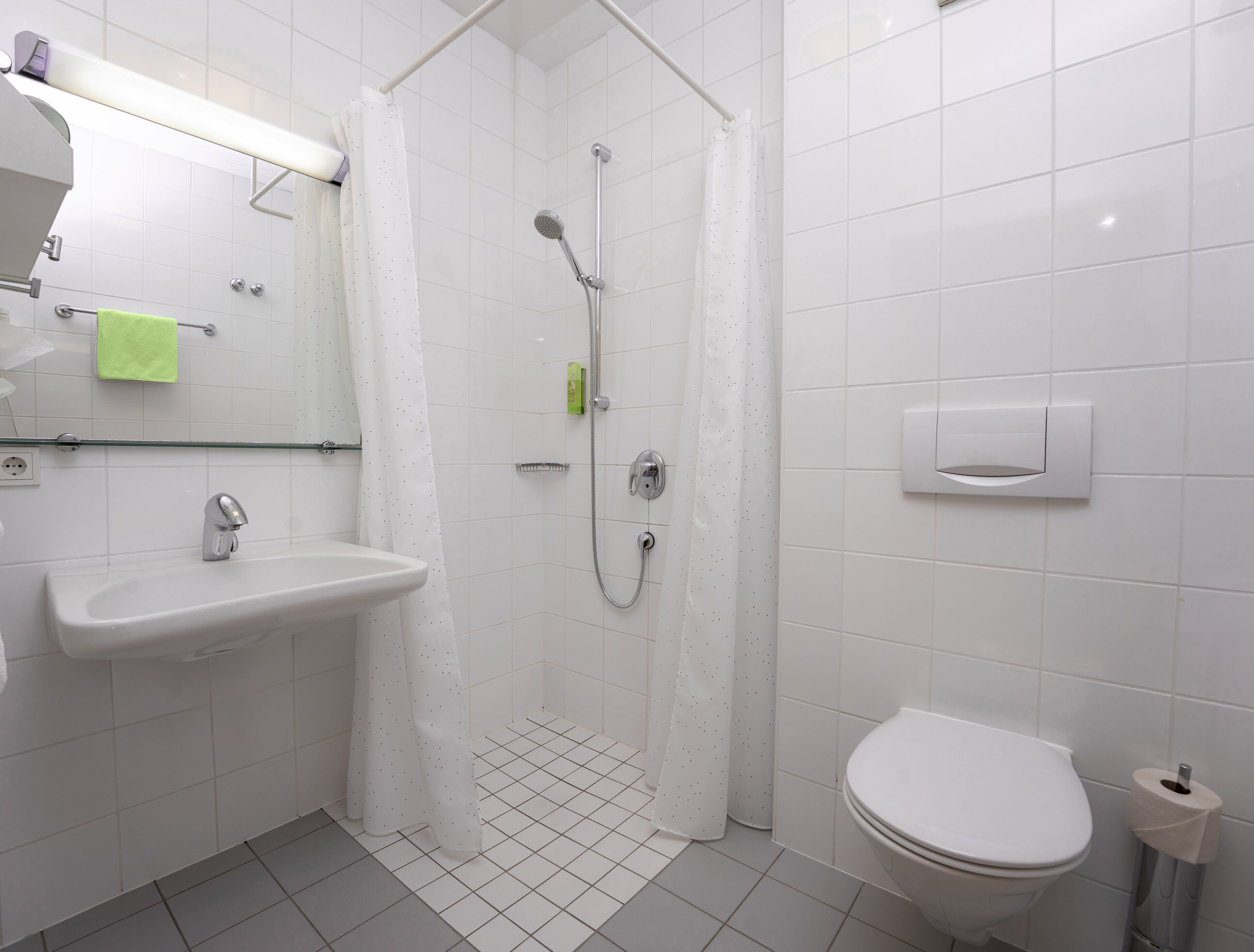 eco-friendly toiletries, hair dryer, towels