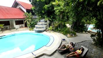 Outdoor pool, sun loungers