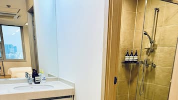 Shower, free toiletries, hair dryer, slippers