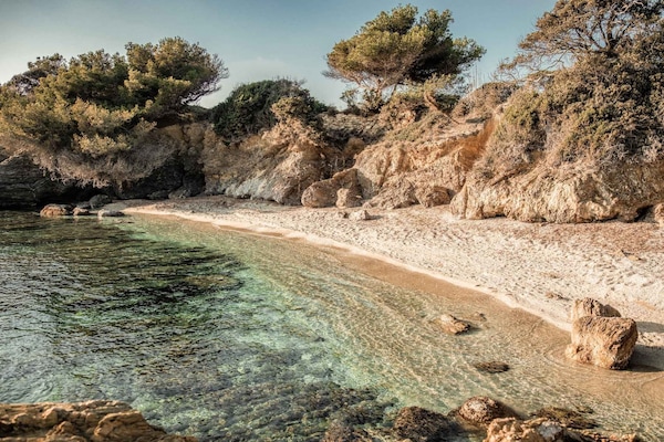 On the beach, snorkeling, windsurfing, sailing
