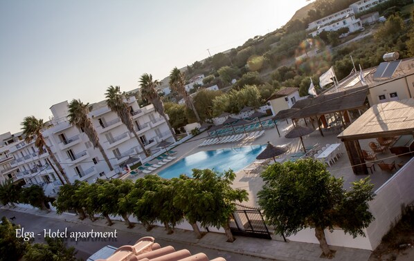 Outdoor pool, pool umbrellas, pool loungers