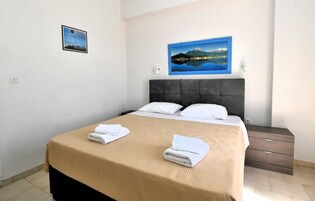 Apartment, 2 Bedrooms | Iron/ironing board, free cribs/infant beds, free WiFi