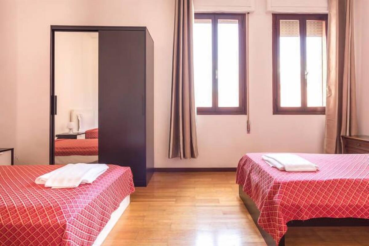 Economy Quadruple Room, Shared Bathroom | Premium bedding, desk, iron/ironing board, free WiFi