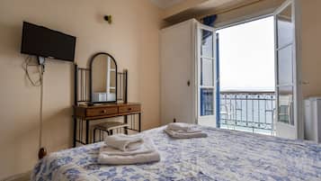 Habitación con 1 cama matrimonial o 2 individuales | Cortinas blackout, cunas gratuitas, wifi gratis y ropa de cama