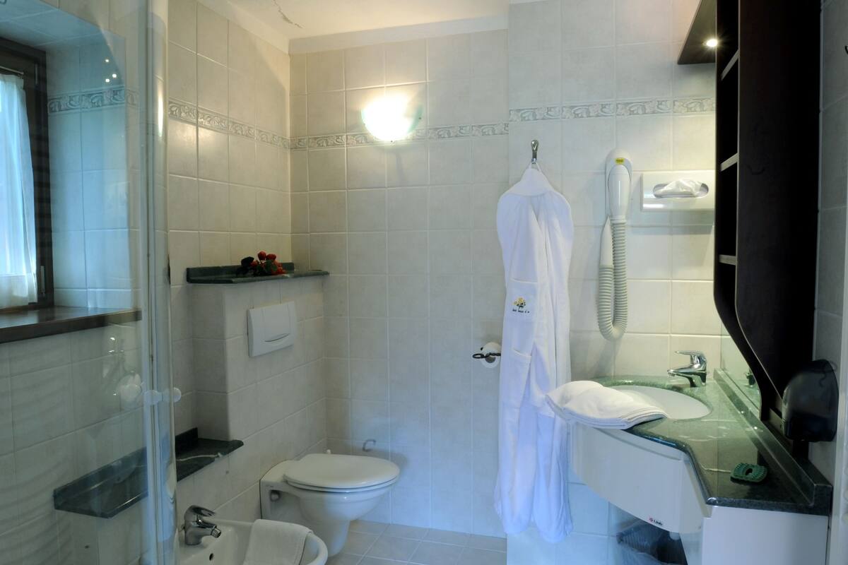 double room, mountain view | bathroom | shower, hair dryer, towels