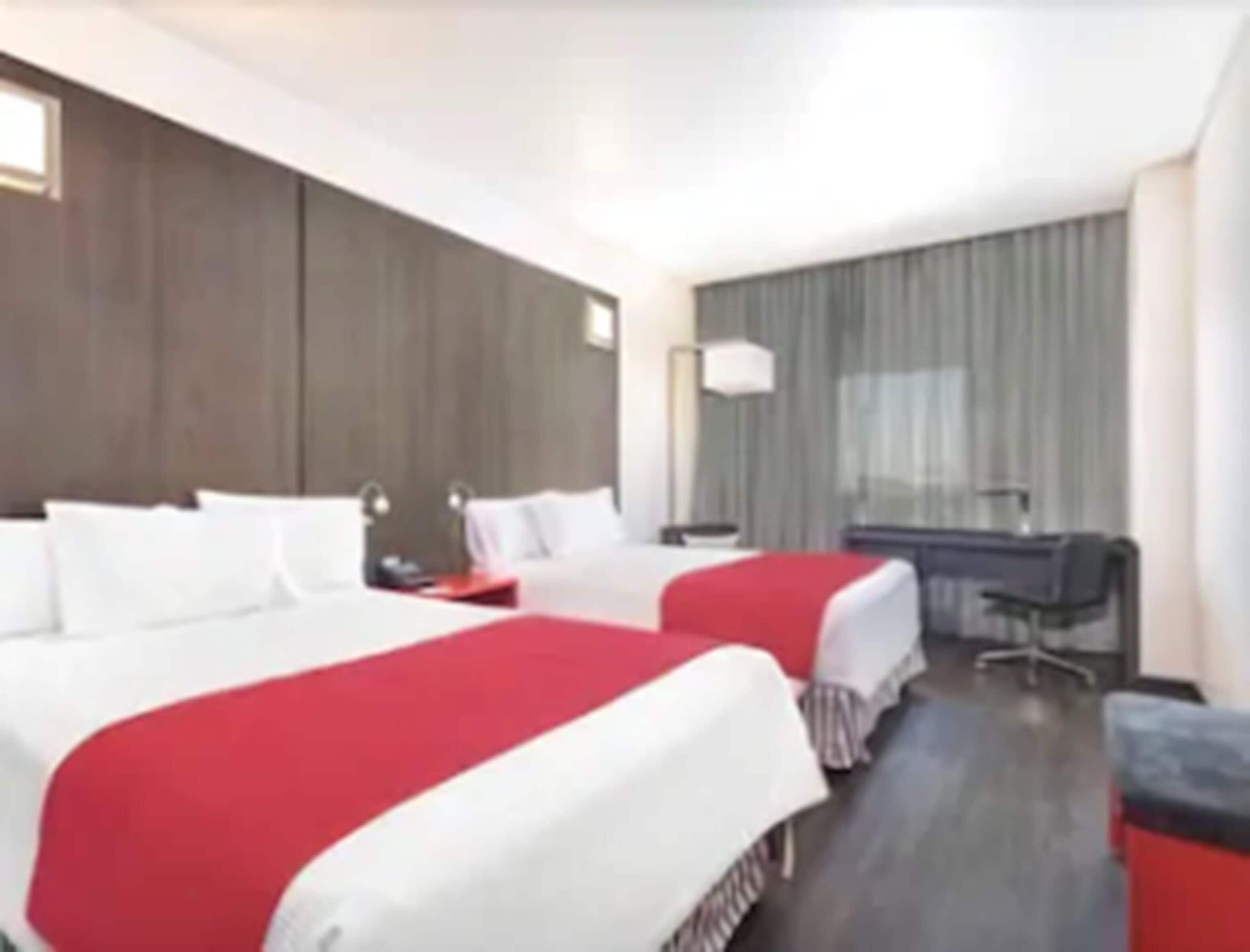 room, 2 double beds, non smoking | in-room safe, soundproofing, iron/ironing board, free cots/infant beds