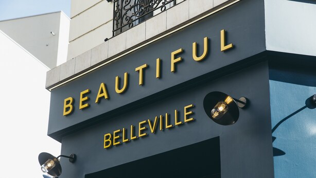 A building with a sign that reads "BEAUTIFUL BELLEVILLE". - Beautiful Belleville Hostel & Hotel (Paris)