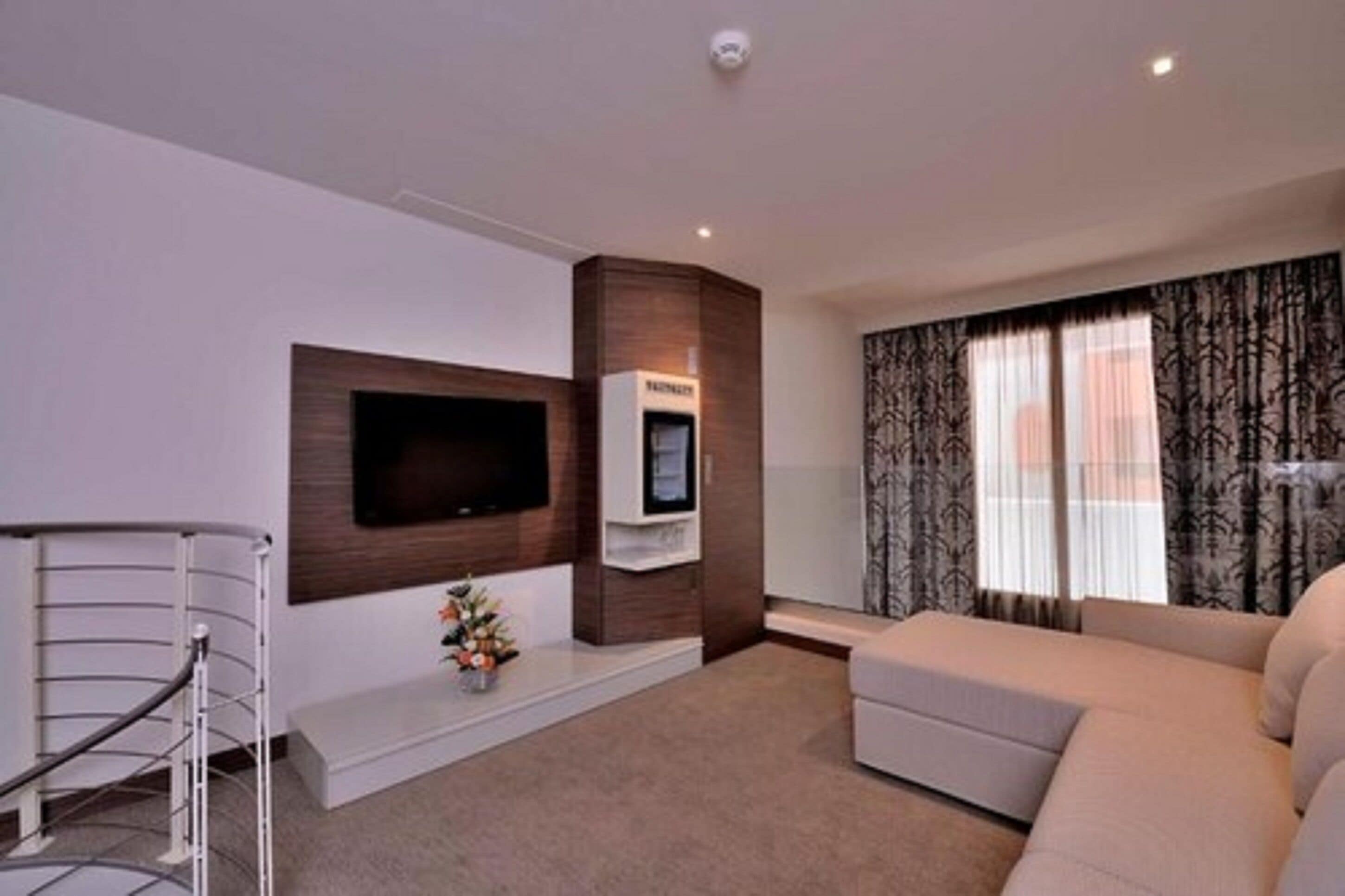 family suite, city view | living area | lcd tv