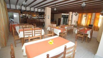 Breakfast, lunch, dinner served; local cuisine